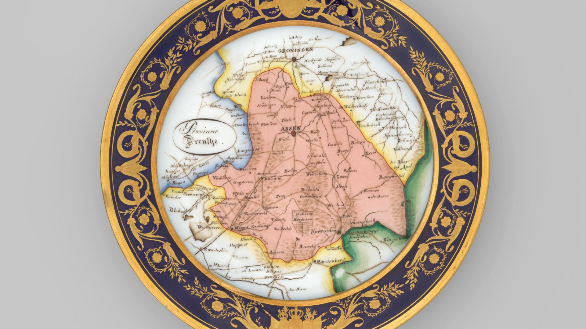 18 plates, each decorated with a Netherlandish province